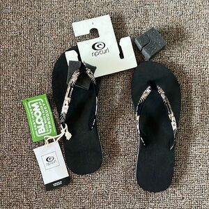 Rip Curl Black Flip Flops with Floral Straps